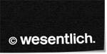 wesentlich.visuelle kommunikation Logo